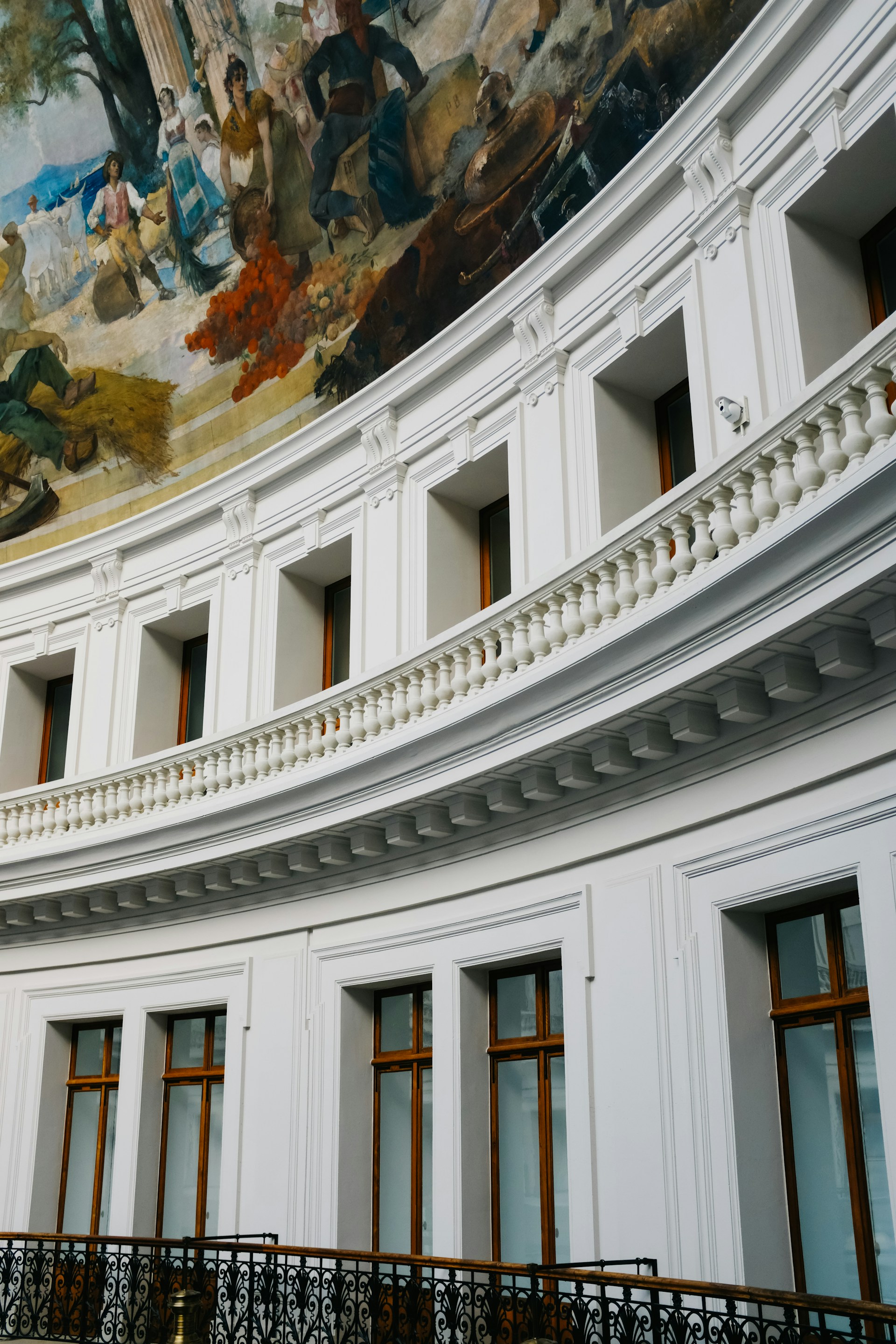 woman wearing yellow long-sleeved dress under white clouds and blue sky during daytime
