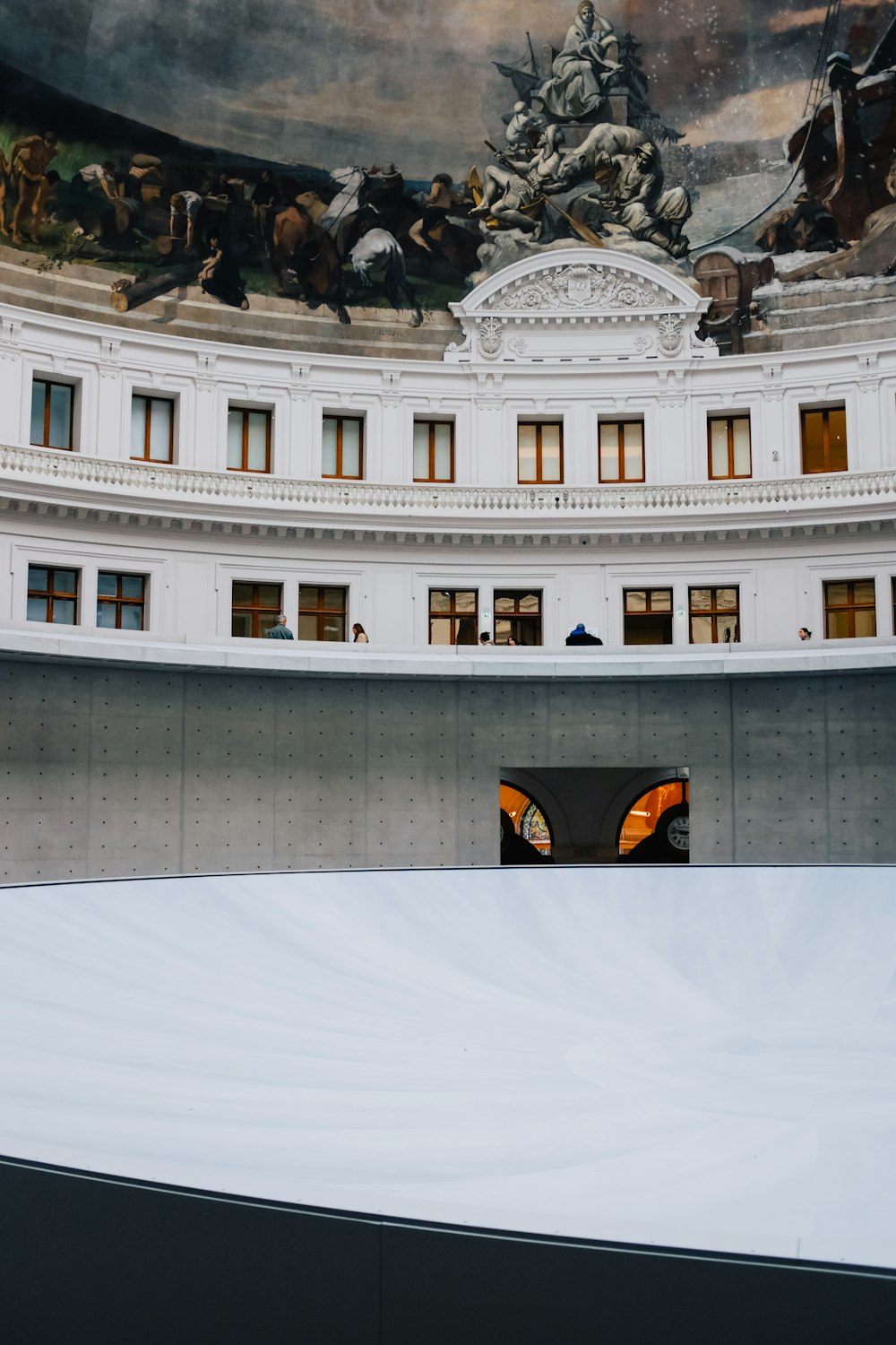 a man riding a skateboard on top of a ramp