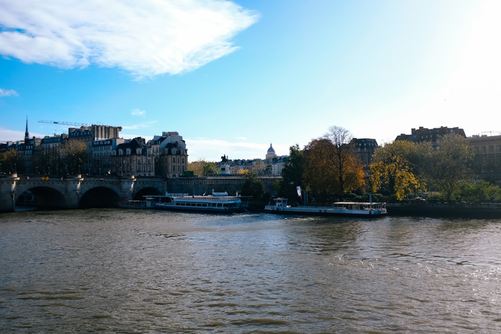 a river that has some boats on it