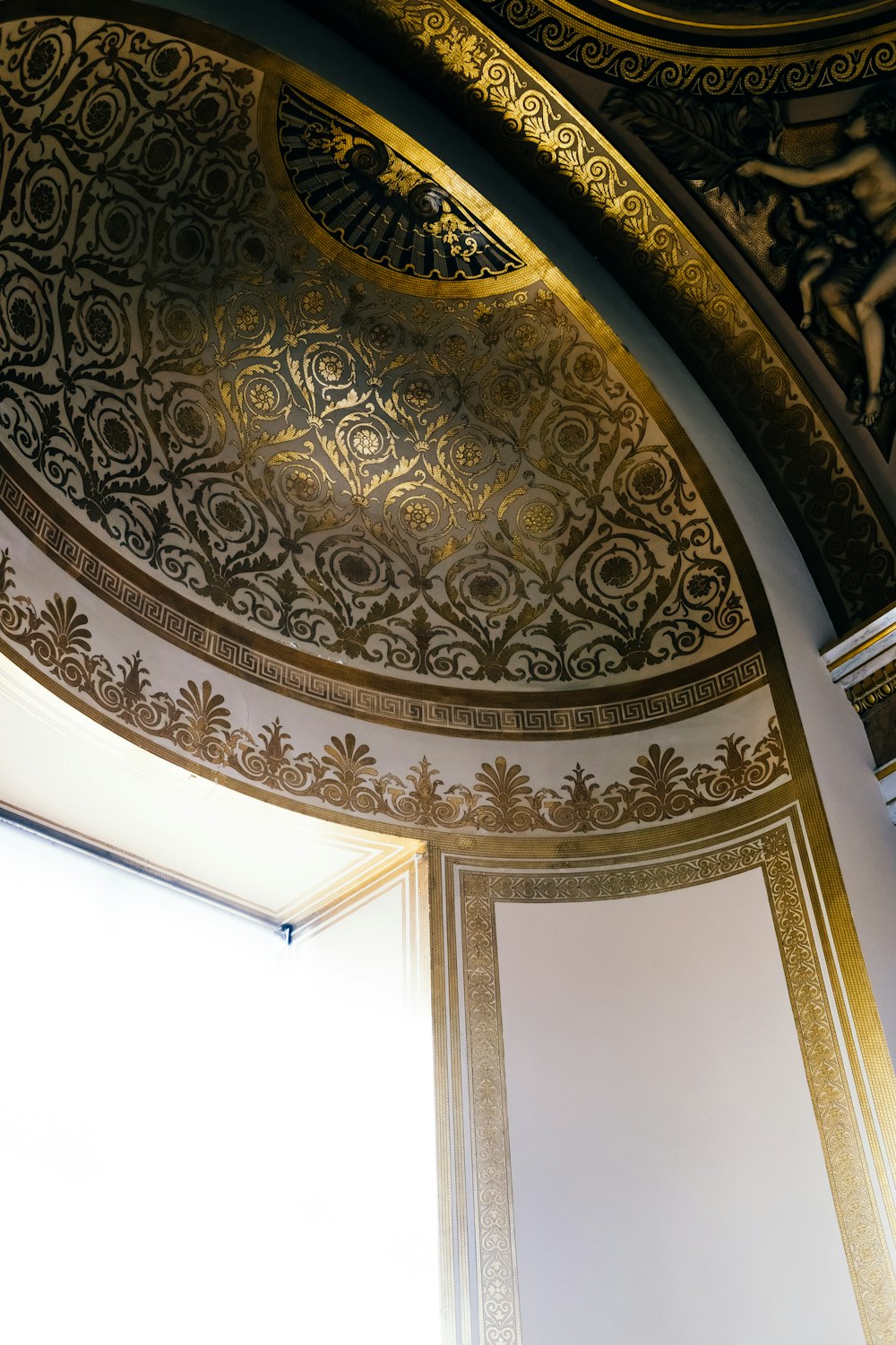 a gold and black ceiling in a room