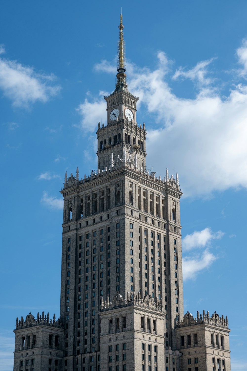 a very tall building with a clock on the top