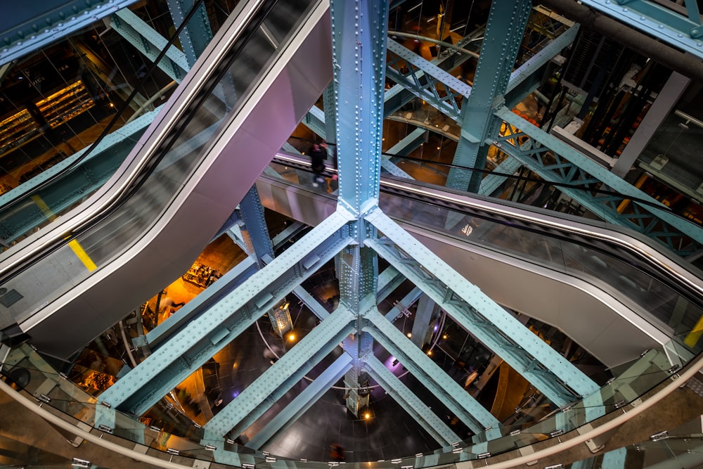 an overhead view of an escalator in a building