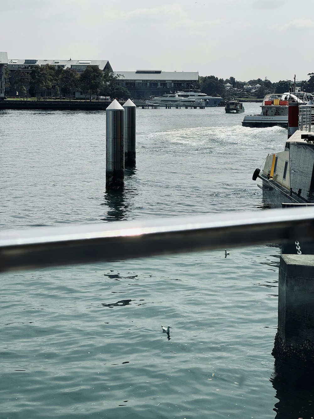 a large body of water with a boat in it