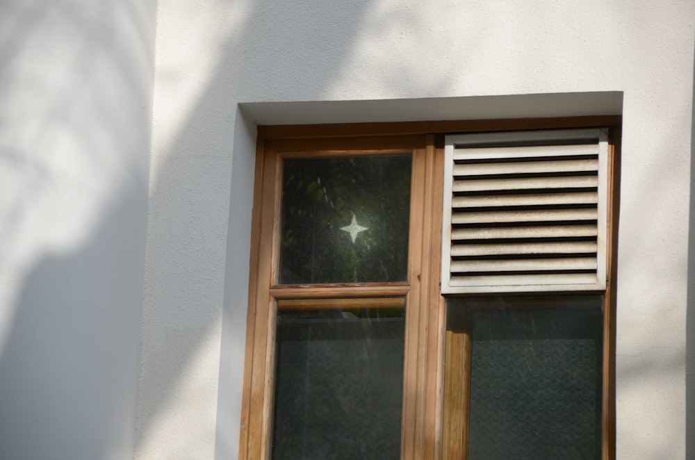 a window with a star on the window sill