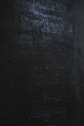 Ancient runes glowing faintly on a dark stone altar.