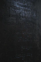 A dramatic fusion of Viking runes and Egyptian hieroglyphs glowing against a dark, textured background.