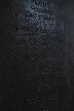 A dramatic fusion of Viking runes and Egyptian hieroglyphs glowing against a dark, textured background.