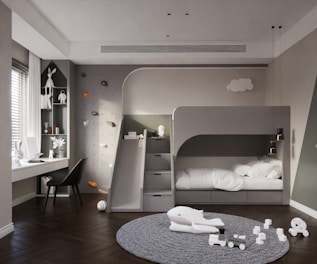 A stylish bunker bed room showcasing comfortable beds and organized storage for a neat living space.