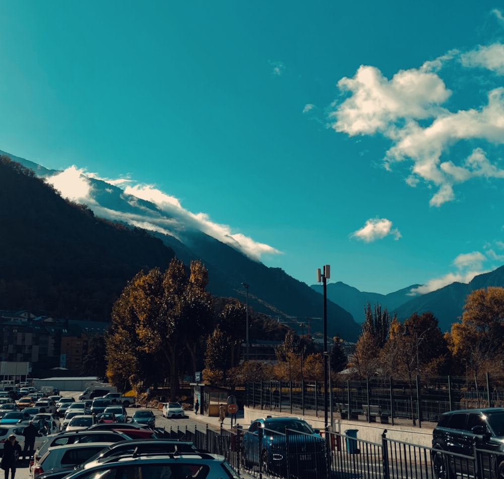 a parking lot filled with lots of parked cars