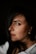 a close up of a person wearing a white shirt