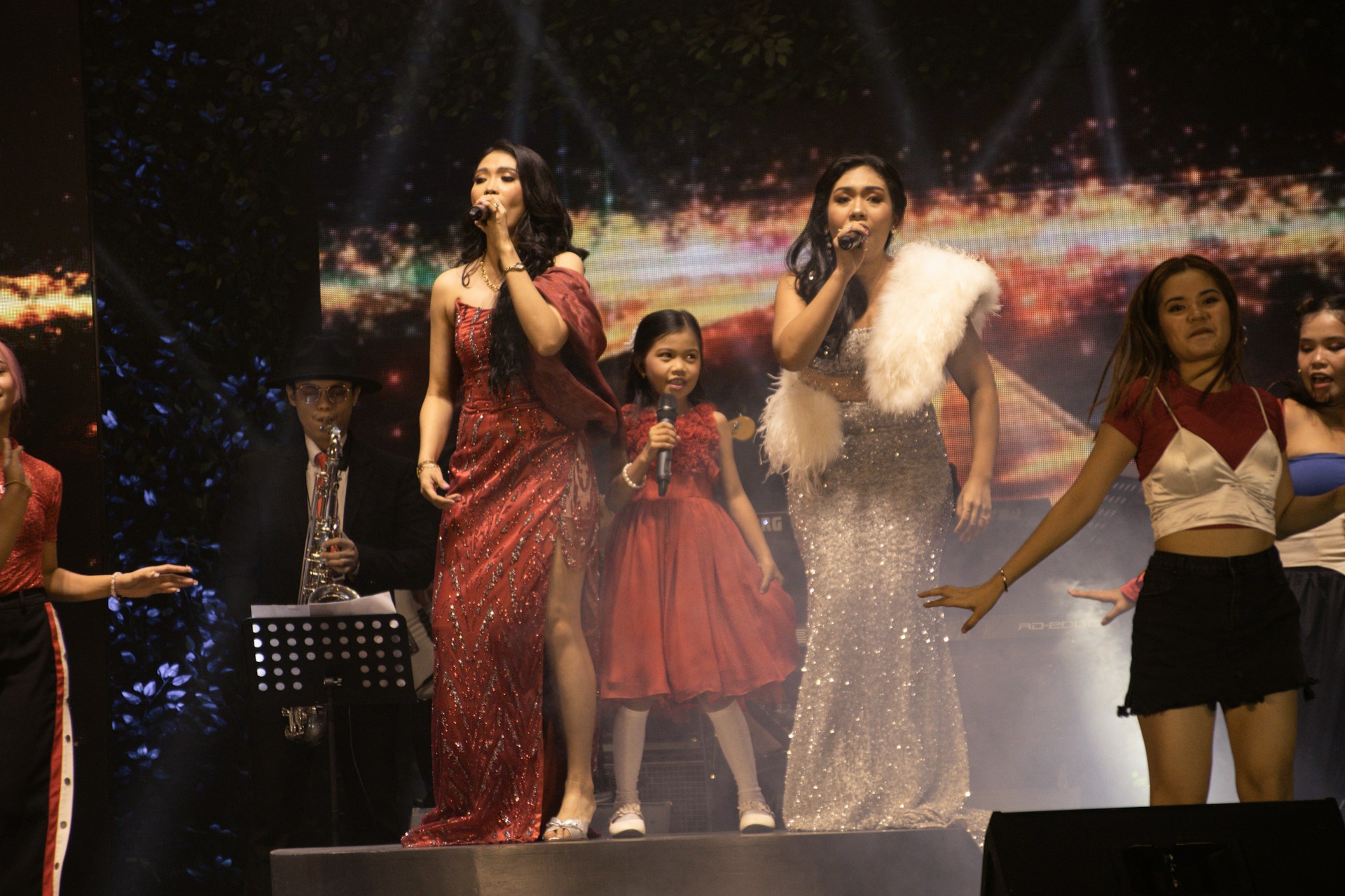 woman wearing yellow long-sleeved dress under white clouds and blue sky during daytime