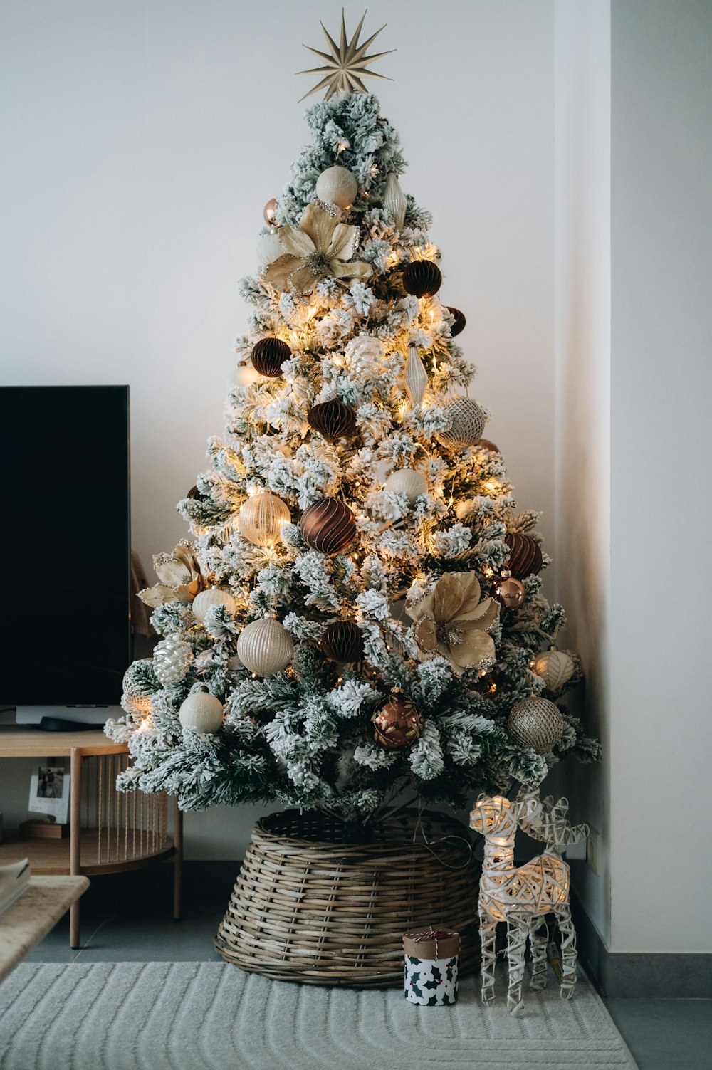a decorated christmas tree in a living room