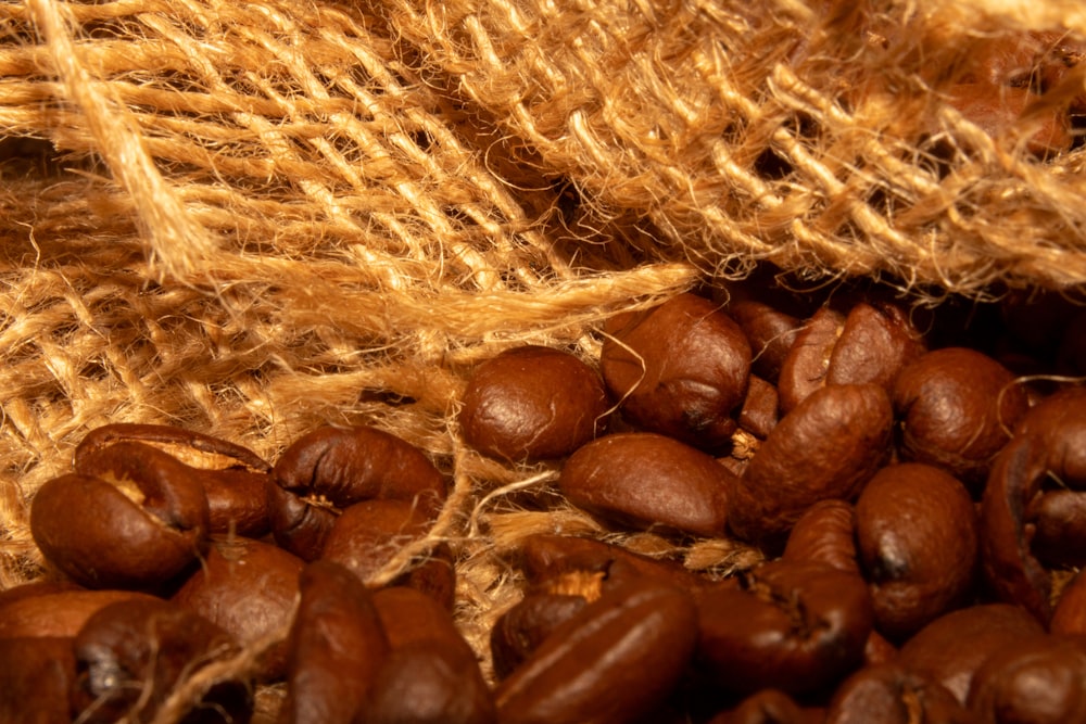 a pile of coffee beans sitting on top of a table