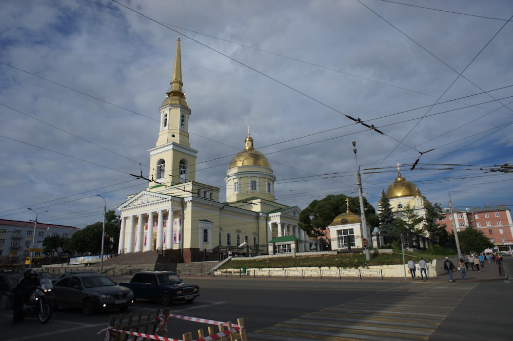 a large white church with a golden dome