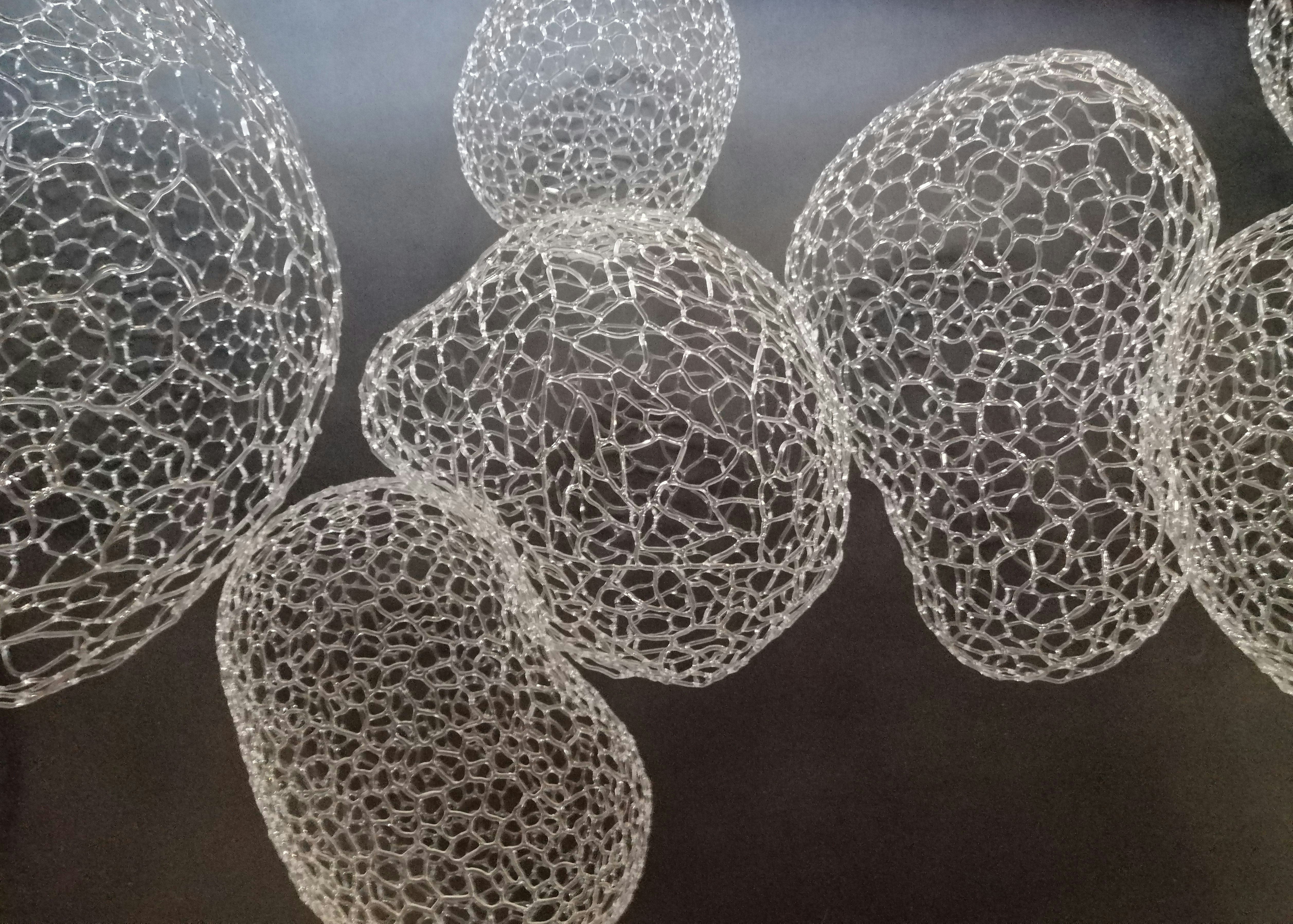 a black and white photo of a bunch of balls