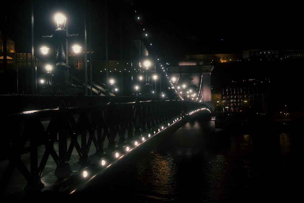 a bridge that is lit up at night