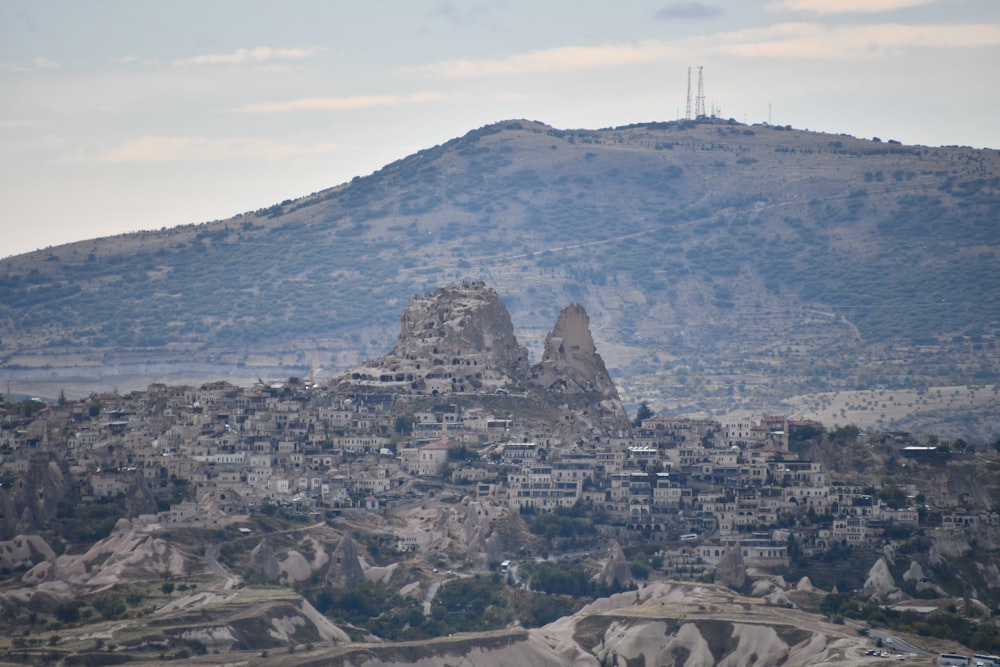 a mountain with a city on top of it