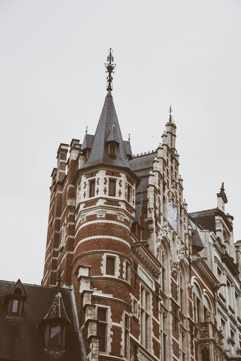 a tall building with a clock on the top of it