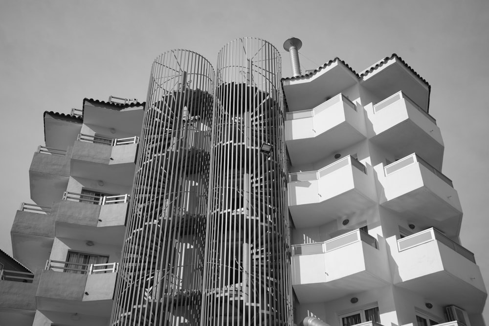 a very tall building with many balconies on it