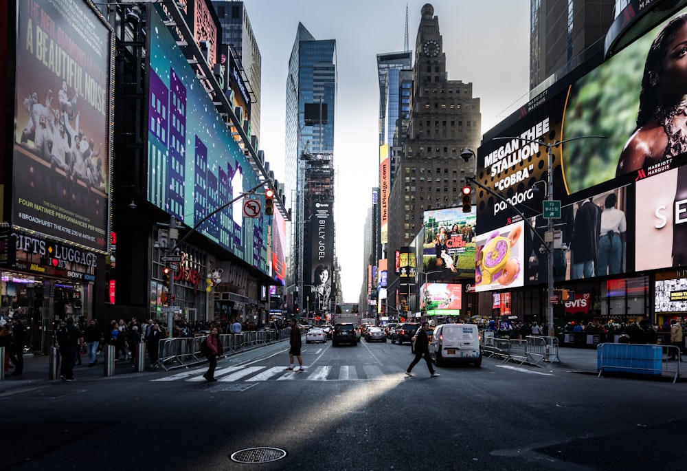 a city street filled with lots of tall buildings