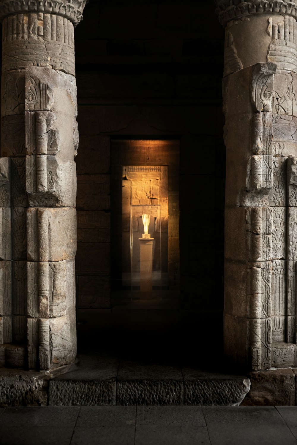 a doorway with a light shining through it