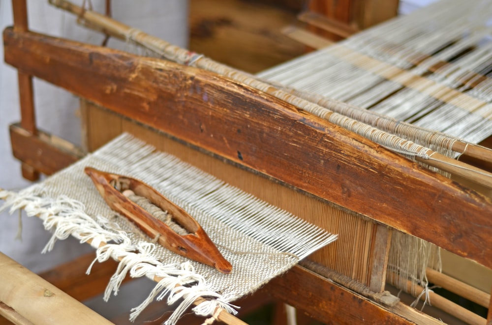 a close up of an old weaving machine