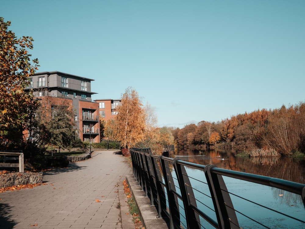 a walkway next to a body of water