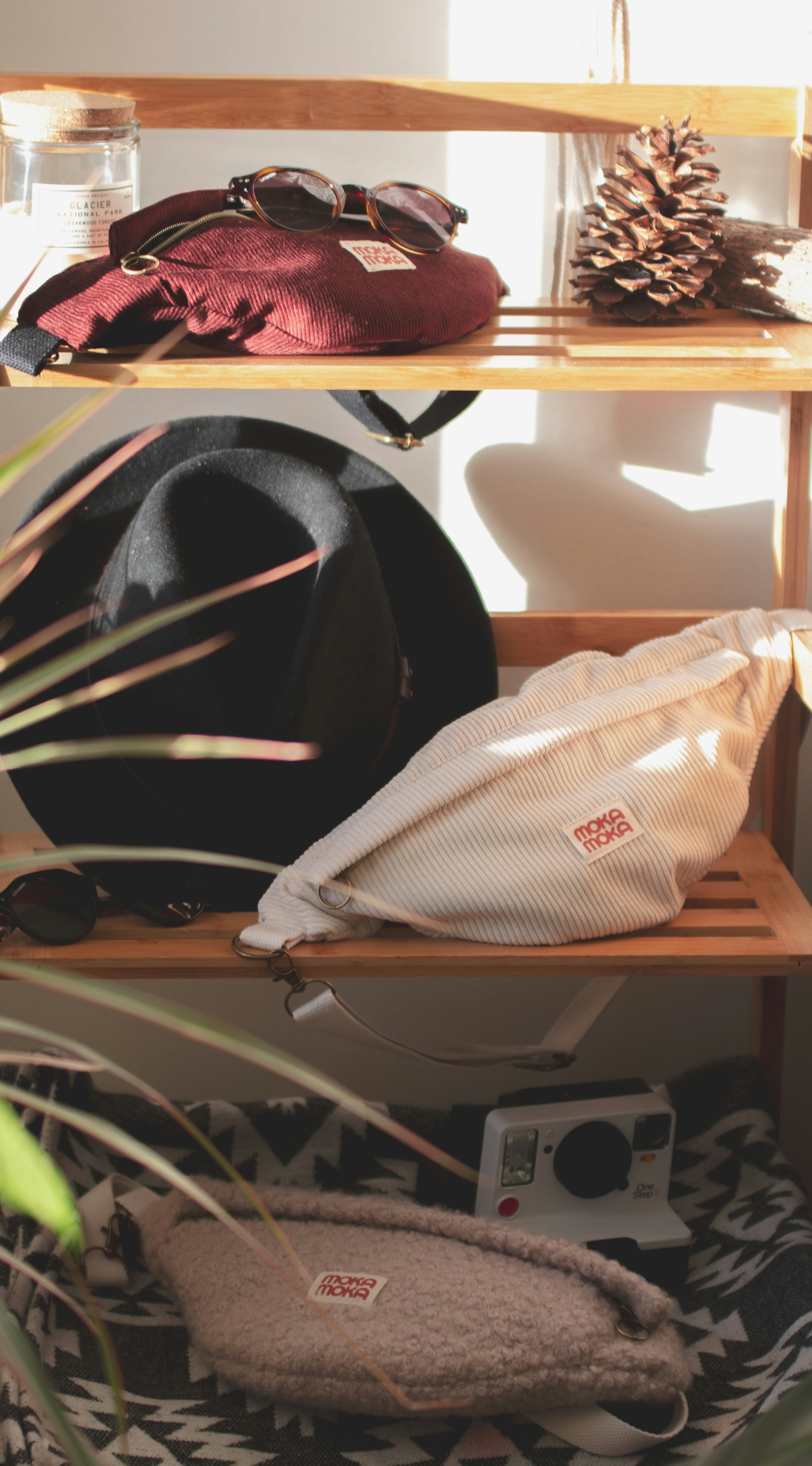 a shelf filled with hats and other items