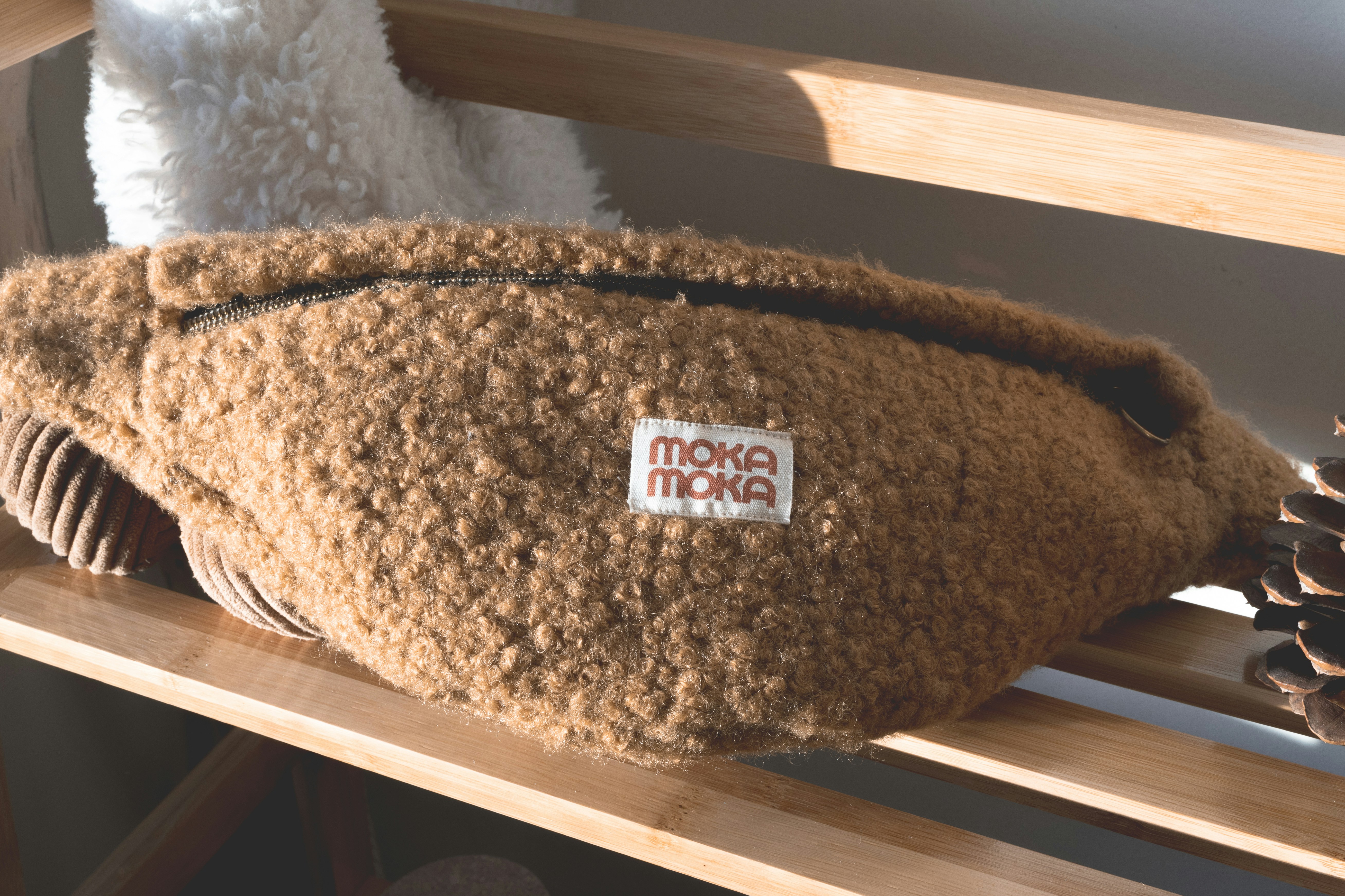 a close up of a stuffed animal on a shelf