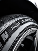 A close-up of high-performance tires on display.