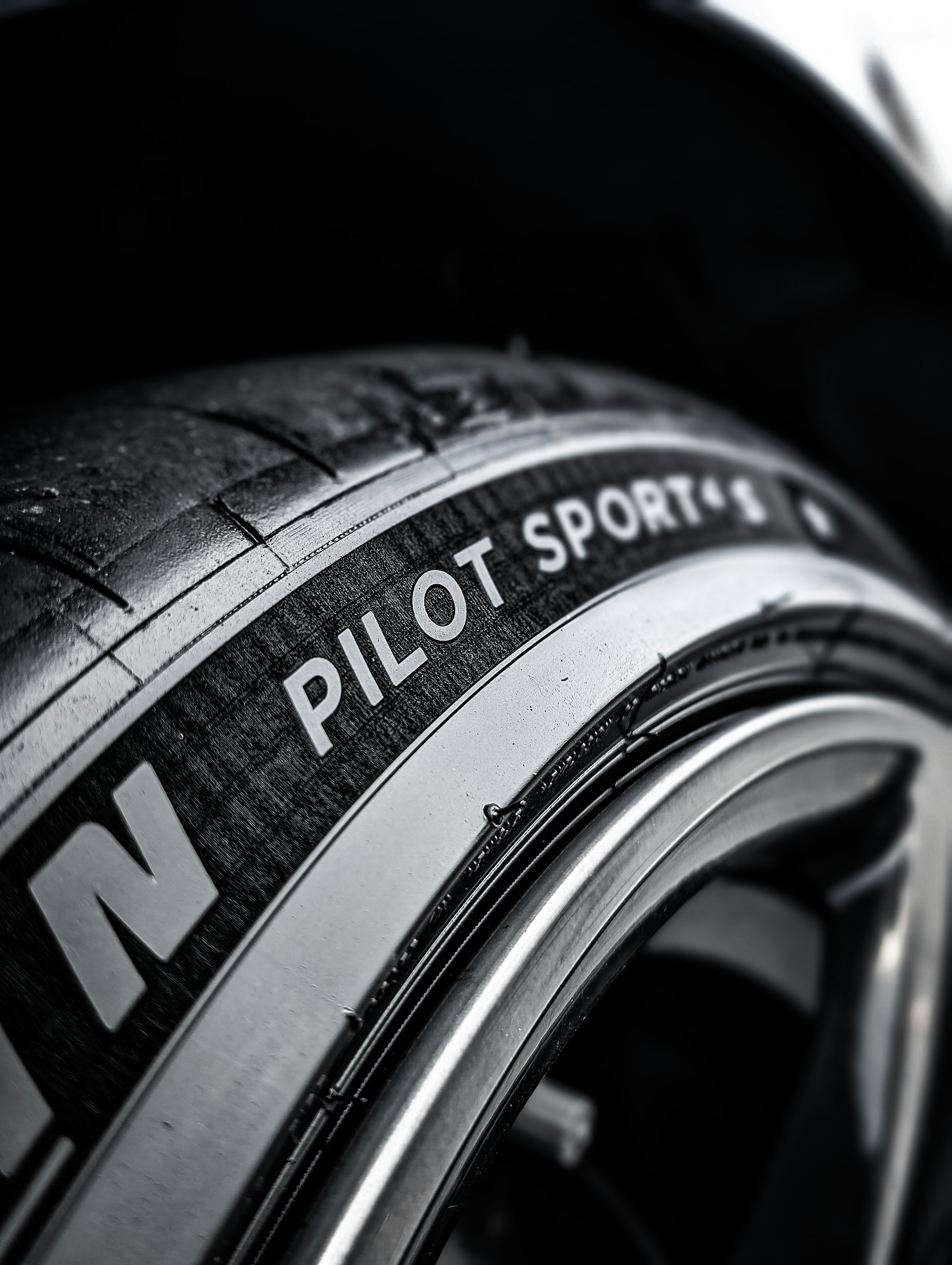 a close up of a tire on a car