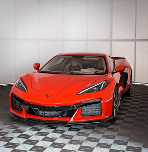 A vibrant sports car displayed at a car show.