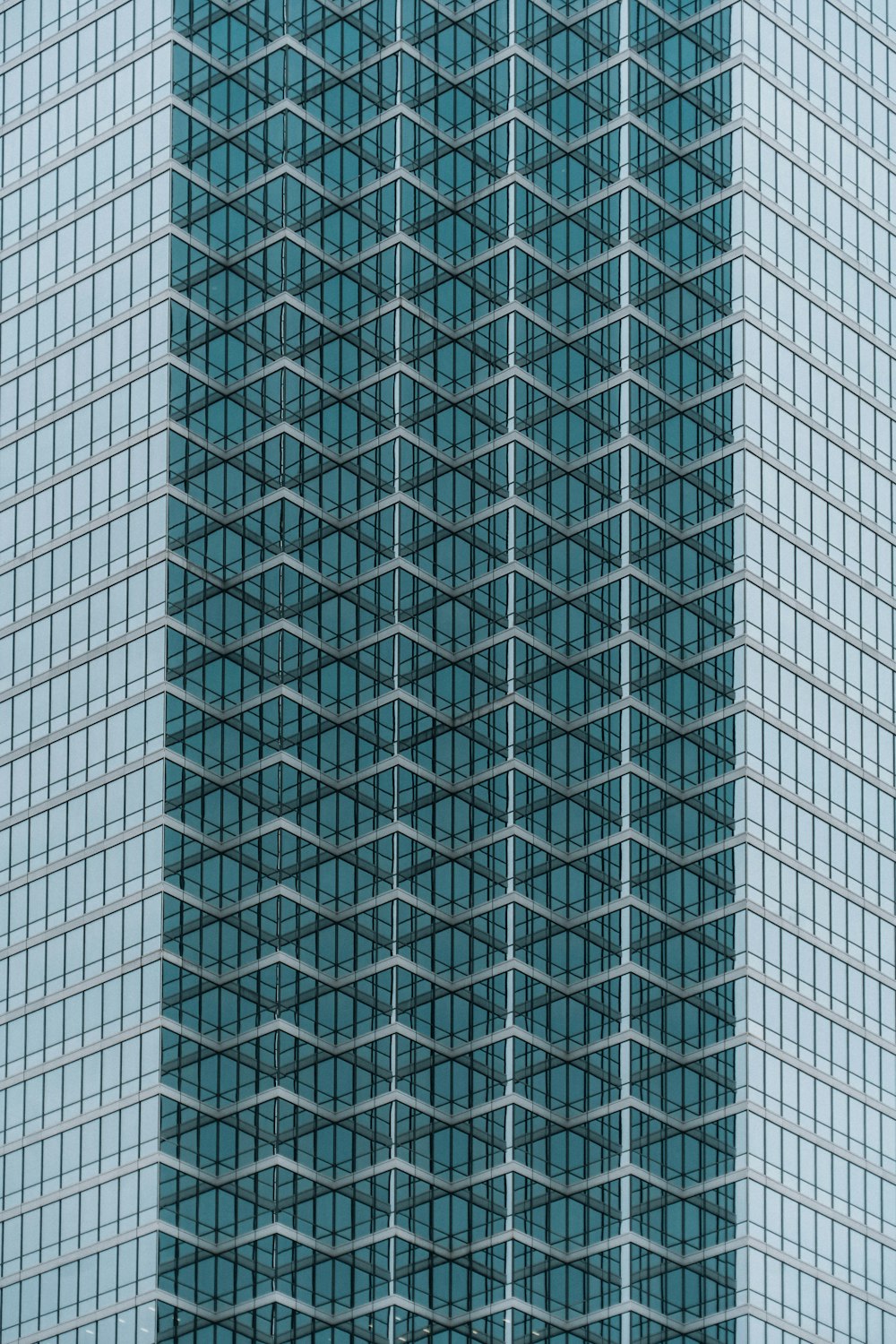 a very tall building with many windows in front of it