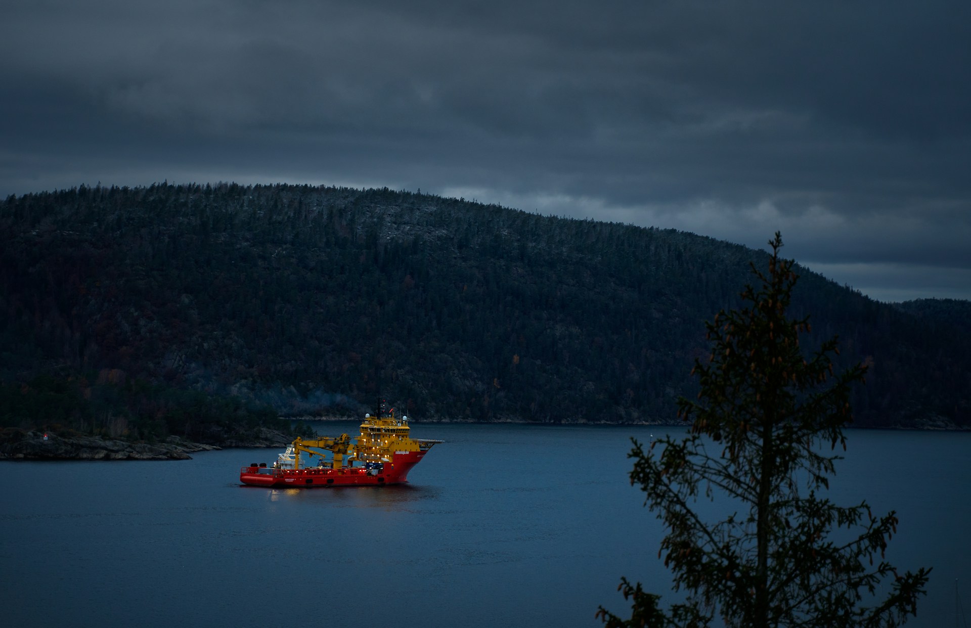 a large boat floating on top of a large body of water