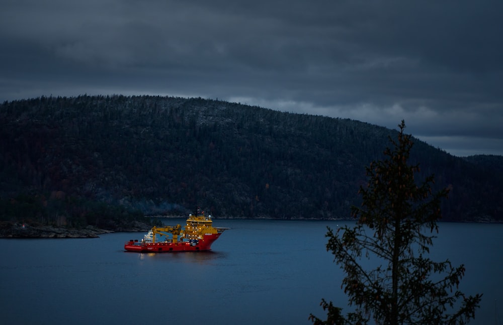 a large boat floating on top of a large body of water