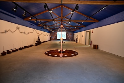 A calm, inviting room set up for a mindfulness and wellness workshop with soft blue and cyan accents.