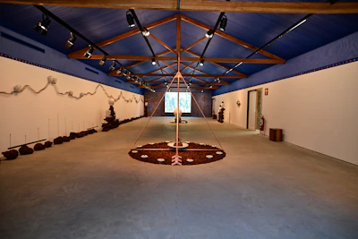 A serene therapy room with soft blue and beige tones, inviting calm and reflection.