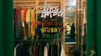 a store window with a sign that says shop