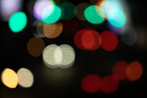 a blurry photo of a city street at night