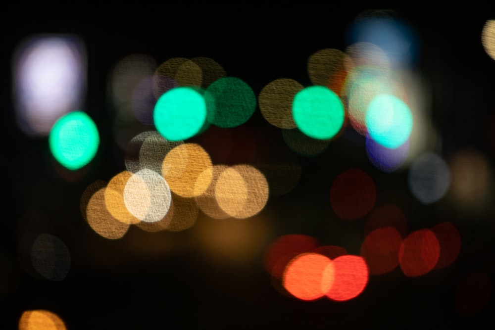 a blurry photo of a city street at night