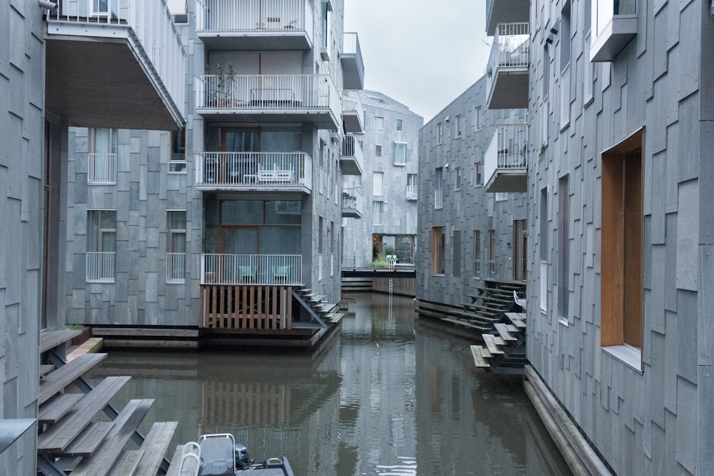 a canal in a city with buildings on either side of it