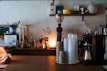 A cozy corner with coffee brewing equipment and a cup ready to serve