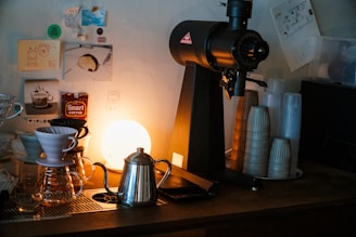 Compact coffee maker brewing a fresh cup of coffee in a cozy kitchen setting