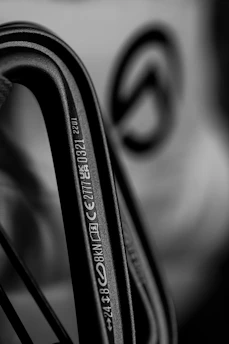 a black and white photo of a pair of scissors