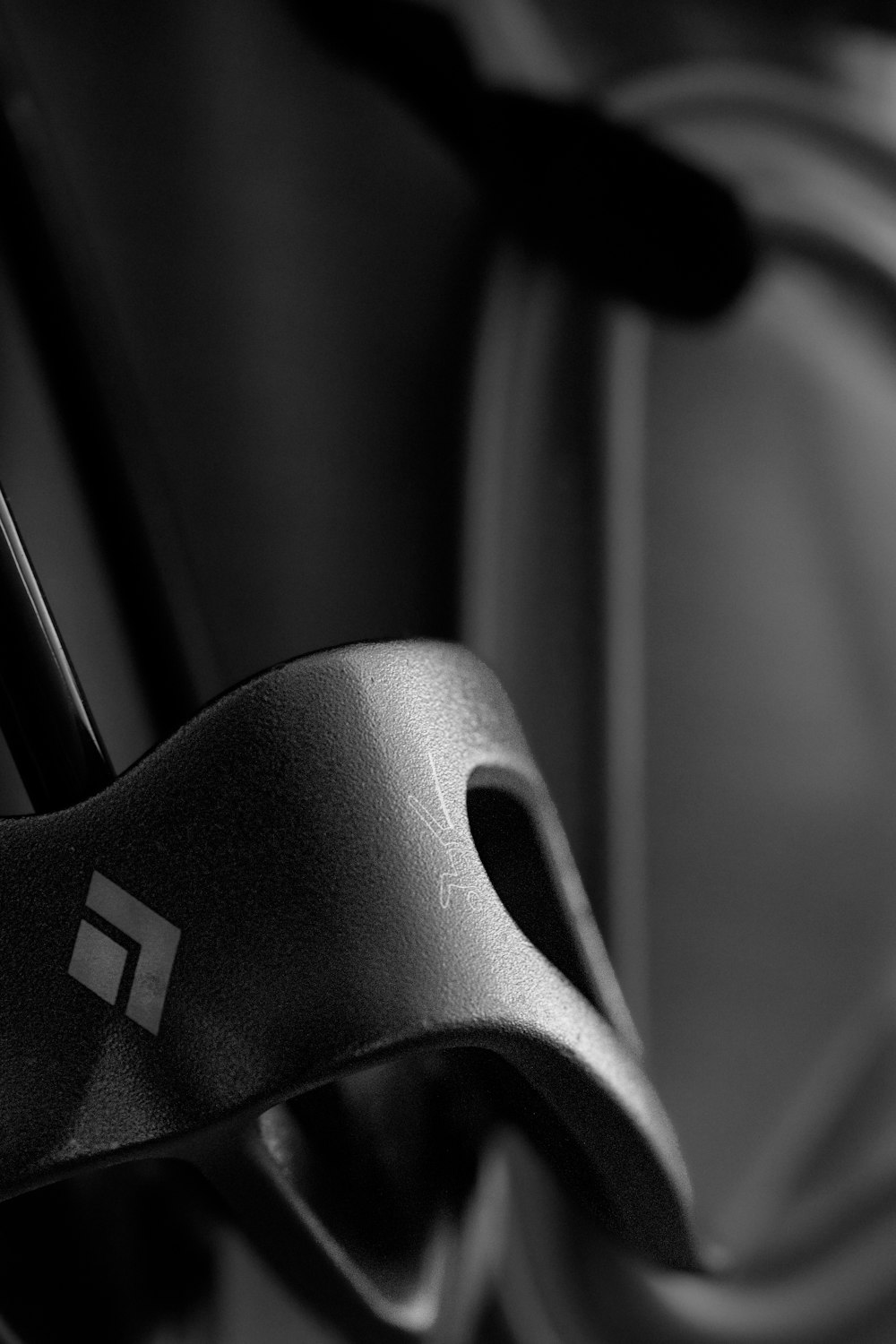 a black and white photo of a bike handle