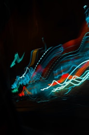 Cyberpunk dragon intertwined with neon stars against a dark blue cosmic background.