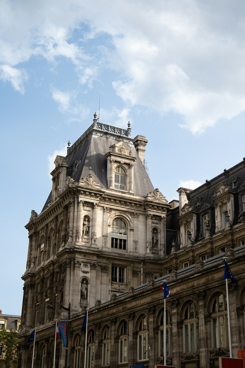 a large building with a clock on the top of it