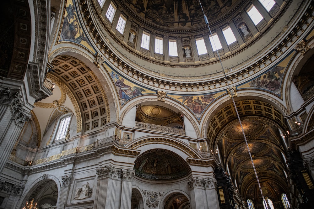 the inside of a church with a domed ceiling