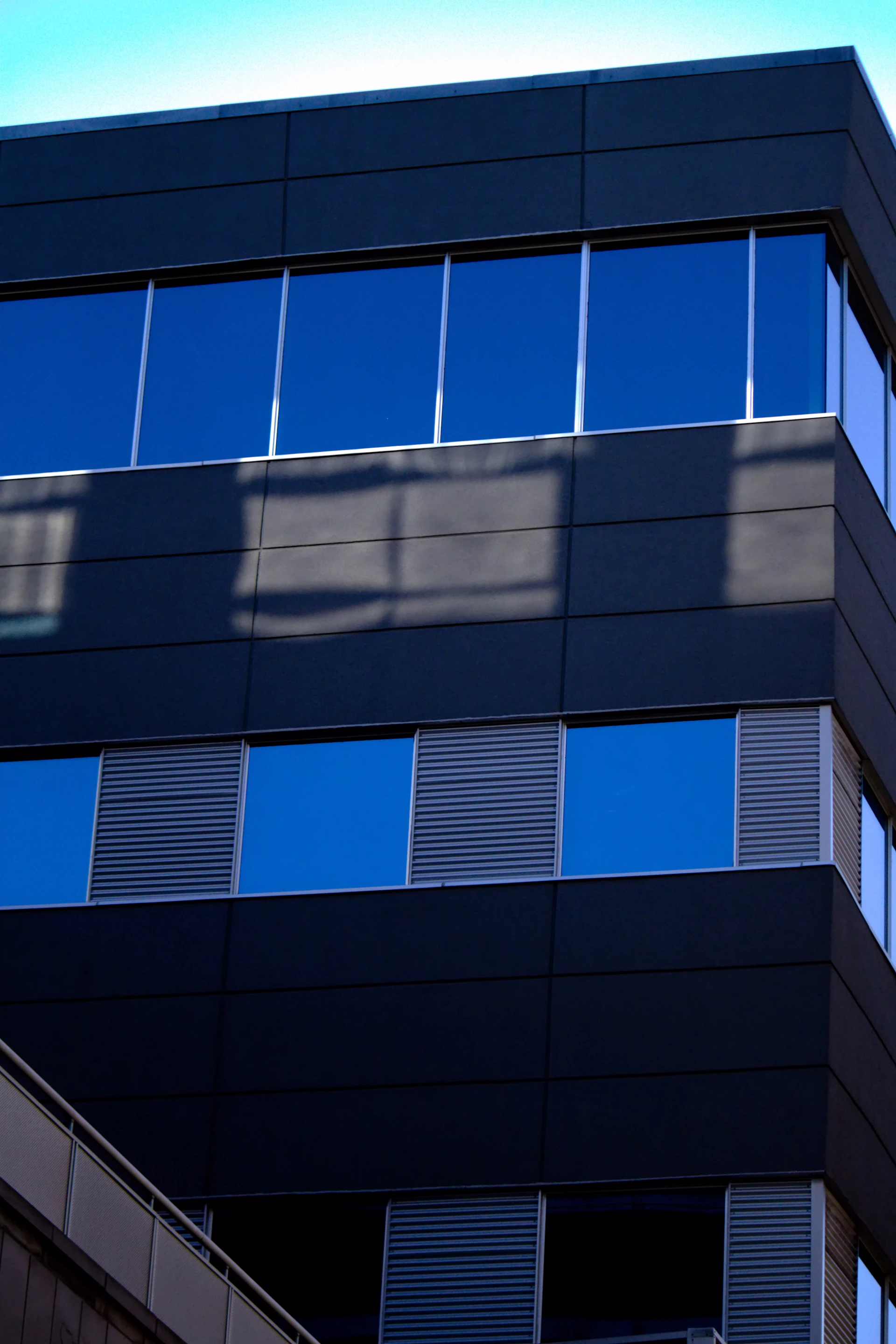 a tall building with a clock on the side of it