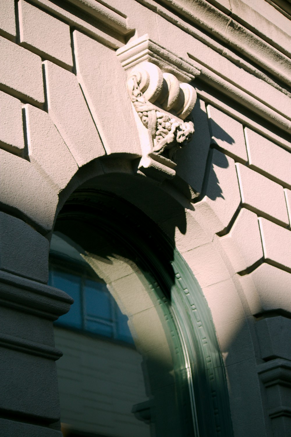 a close up of a clock on the side of a building